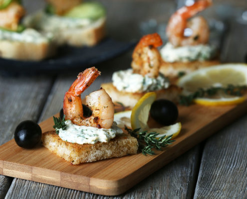 Grilled Shrimp with spinach dip on toasted bread
